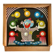 a wooden box with an image of a clown on it