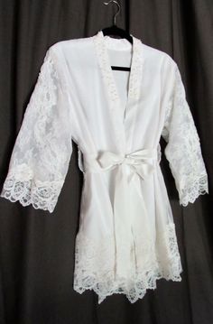 Bridal Robe from Mom's Dress Elegant Mother Of The Bride Gown With Delicate Lace, Elegant Lace Wedding Robe, Fitted Lace Wedding Robe, Wedding Night Dress With Lace Bodice, Satin Wedding Gown With Lace Trim, White Robe For Mother Of The Bride, Elegant Lace Trim Gown For Bridal Shower, Cream Lace Trim Wedding Robe, Satin Wedding Robe