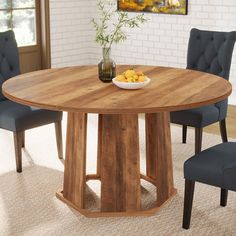 Farmhouse Style - This round dining table features a rustic wood grain finish top and an unique wooden pedestal base, creating a warm and charming farmhouse ambiance. Room for All - Measuring 47.24"L x 47.24"W x 29.53"H, this kitchen table comfortably seats 4-6 people, providing ample tabletop space for meals and tableware. Built to Last - Built with 1.18" thick MDF and a sturdy wooden base, this round table offers endurance and longevity, featuring a scratch-resistant and easy to clean tabletop. Adaptable and Practical - Suited for petite dining spaces or breakfast nooks, this compact table is ideal for family dinners, game nights, or gatherings with friends. Simple Assembly - All essential hardware, tools, and clear instructions are included. Reach out to us with any product-related ques Round Dining Table Farmhouse, Wood Dinner Table, Circle Dining Table, Round Conference Table, Compact Table, Wooden Pedestal, Breakfast Nooks, Farmhouse Kitchen Tables, Charming Farmhouse