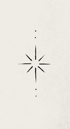 a black and white drawing of a star