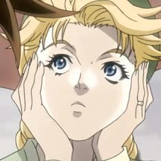 a woman with blonde hair and blue eyes is holding her hands to her face while looking at the camera