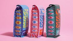 three different types of skateboards on a pink and blue background with the same design