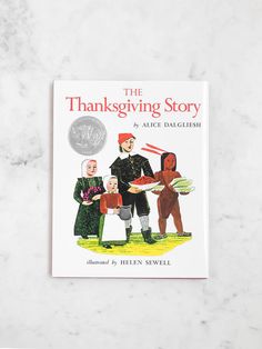 the thanksgiving story by alice daughish on a marble surface with an illustration of two people