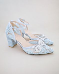 Crochet Lace Wedding Shoes Collection. Classic and refined almond toe crochet lace with added pearls applique. Choose from regular ankle straps or pearl ankle straps and tie silky ribbon bow at the back for a secure fitting. The luminous pearls makes this a classy and elegant bridal shoes.DETAILS:HEELS: 2.75 inchesUPPER: Synthetic upper and liningMATERIALS: Manmade outsoleORIGIN: Imported Embellished Lace High Heels, Evening Wedding Shoes With Lace And Closed Toe, Lace Closed Toe Wedding Shoes For Evening, Lace Wedding Shoes Closed Toe For Evening, Spring Wedding Lace Shoes, Lace Low Heel Wedding Shoes, Lace Ankle Strap Wedding Shoes, Spring Wedding Shoes With Ankle Strap In Lace, Spring Wedding Shoes With Lace And Ankle Strap