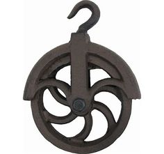 an old fashioned cast iron hook on a white background