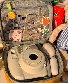 an open suitcase with various items in it