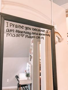 a mirror that has some writing on it