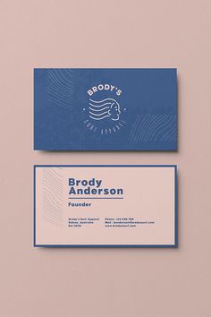 the business card is designed to look like it has waves in blue and beige colors