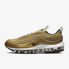 Style No. DQ9131-700 Color: Metallic Gold/Black/White/Varsity Red Push your style full speed ahead with the Air Max 97. Its iconic design takes inspiration from water droplets and Japanese bullet trains. Full-length Nike Air cushioning lets you ride in performance comfort. Lace up and ride first class. Nike Air Max 97 Women's Shoes. Nike Air Max 97 Women, Air Vapormax Plus, Nike Air Vapormax Plus, Nike Model, Nike Models, Air Max Shoes, Nike Air Max For Women, Air Max Women, Nike Air Vapormax