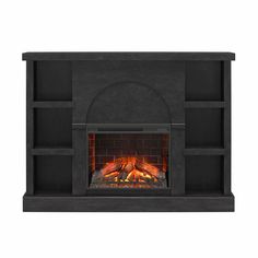 a fireplace with an open fire place and shelves on either side, in black stone