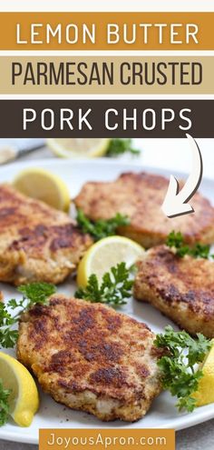 lemon butter parmesan crusted pork chops on a white plate with lemon wedges