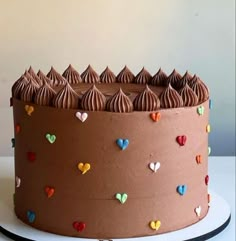 there is a chocolate cake with hearts on it