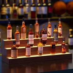 an assortment of different types of liquor on display