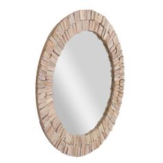 a round mirror made out of wood with a stone border around the edge and a white background