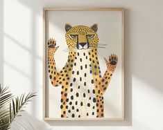 a painting of a cheetah is hanging on the wall next to a potted plant