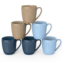 five coffee mugs stacked on top of each other