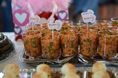 there are many appetizers on the trays ready to be served for guests