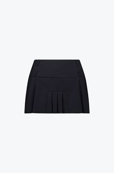 The Dua Pleat Mini Skirt features dual asymmetric box pleats, with four small pleats centered at the front and larger pleats around the circumference. Designed to sit low rise, mini in length. Detailed with an a large waistband and double belt loops, allowing you to stack belts for extra detail. This skirt fastens with a side zip. Paired perfectly with the Structured Mini Tee. Crafted in a soft Wool blend fabric. MADE IN AUSTRALIA. Fabric: 37% Wool, Polyester 57%, Viscose 10%, Elastane 3% Care: Cold hand wash inside out ONLY; lay out flat to dry. Dry low iron (no steam) Do not: tumble dry, machine wash, spin, wring, bleach, steam, hot iron. This garment is true to size. We recommend taking your normal size Franny is 174cm, an AU 6/XS [61cm Waist/ 61cm Hips] and wears a size EXTRA SMALL (XS Formal Mini Pleated Skort, Formal Mini Length Pleated Skort, Elegant Mini Skirt For School, Solid Color Skort With Pleated Hem And Short Length, Classic Pleated Waist Short Skort, Solid Color Skort With Pleated Hem, Classic Short Pleated Waist Skort, Classic Fitted Skort With Pleated Hem, Fitted Skort With Pleated Hem For Work