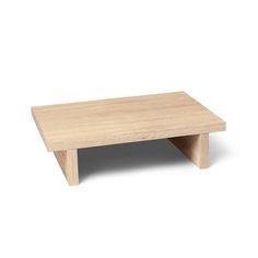 a small wooden table with no legs on it