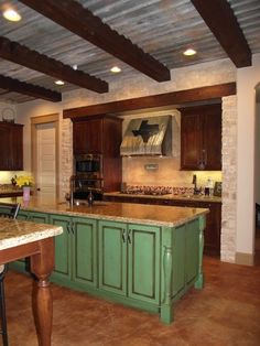 the kitchen is clean and ready to be used as a living room or dining area