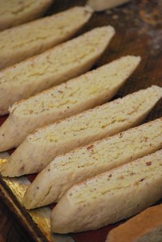 bread sticks lined up on a baking sheet