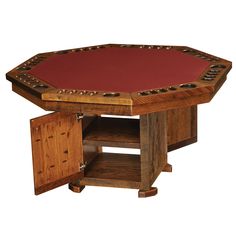 a wooden table with a red cloth on the top and two drawers below it that are open