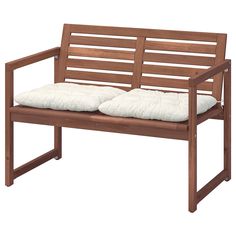 a wooden bench with two pillows on it