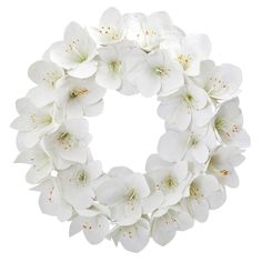 white flowers are arranged in the shape of a wreath