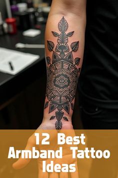 a person with tattoos on their arm and the words 12 best armband tattoo ideas