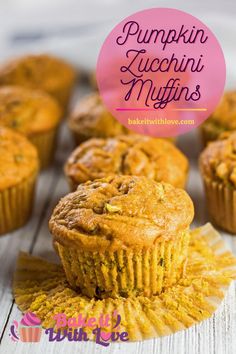 pumpkin zucchini muffins on a wooden table with the title overlay