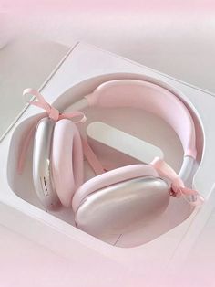 a pair of headphones sitting in a box