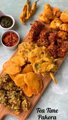 tea time pakbaa fritters platter with dipping sauces on the side