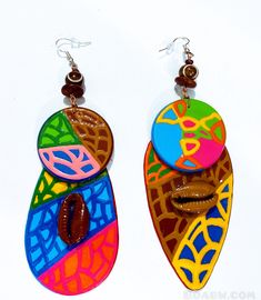 Note: Please Read My shop shipping policies before ordering❤️🖤💚 These beautiful earrings was created by sacred divine hands..  Enjoy the Beautiful Energy,  They were most definitely, made for a Queen 🦋 ✨HOT SELLERS ✨ They are hand painted (using a small metal stick) with acrylic (nontoxic) paints on lightweight wood Glossed with a clear gloss for protection. Size: 4.5in Earrings Approximately Sterling Silver earhook wires  Please don't not let the earrings (wood part) get wet. Remove when taking bath showers , washing hands, dishes, applying lotions or body creams or body oils, etc  Note: items that are handmade/hand painted,  will varies in size, shape or designs.  Clip ons can be added (send a note with order, to adjust) Beads may vary. Thanks for supporting Handmade  You are apprecia Artisan Drop Earrings With Artistic Design, Artistic Brown Jewelry For Festival, Artisan Teardrop Earrings With Artistic Design, Handmade Adjustable Drop Plug Earrings, Artisan Dangle Earrings With Artistic Design, Artsy Multicolor Jewelry With Matching Earrings, Handmade Multicolor Earrings For Gift, Brown Dangle Earrings With Artsy Style, Handmade Multicolor Earrings As Gift