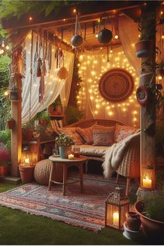 an outdoor living area with lights strung from the ceiling and hanging decorations on the walls