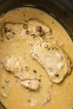 chicken and mushroom soup in the crock pot ready to be served for lunch or dinner