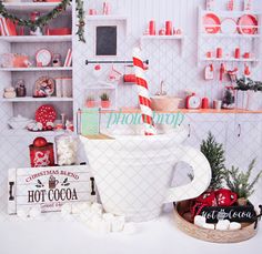 a christmas themed kitchen with candy canes, hot cocoa and marshmallows