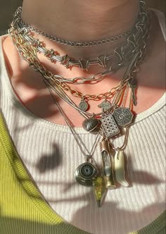 Layered Mixed Metal Necklaces, Maximalist Necklace Layering, Chunky Maximalist Jewelry, Eclectic Silver Jewelry, Maximalist Necklace Stack, Maximalist Earring Stack, Gold And Silver Jewelry Aesthetic, Mixed Metal Charm Necklace, Silver And Gold Mixed Jewelry