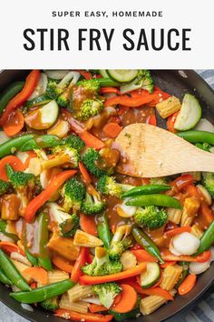 stir fry with broccoli, carrots and other vegetables in a skillet