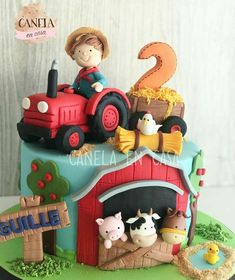 a cake decorated with farm animals and tractor