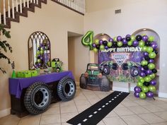 a monster truck birthday party with balloons and decorations