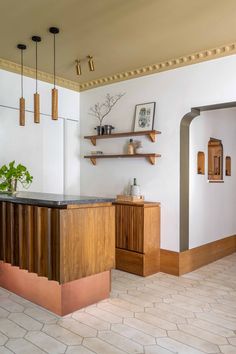 the kitchen is clean and ready to be used for cooking or baking, while also being used as a bar