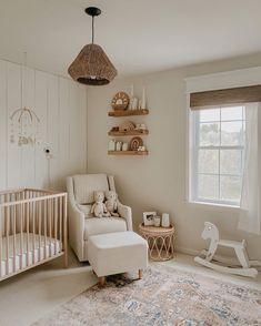 a baby's room is decorated in neutral colors