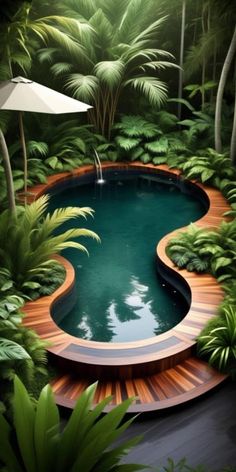 a pool surrounded by lush green plants and trees