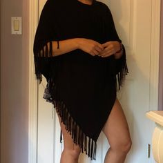 Black Frilly Poncho. Never Worn! Black Bohemian Poncho With Batwing Sleeves, Black Long Sleeve Beach Poncho, Black Long Sleeve Cotton Poncho, Black Oversized Long Sleeve Poncho, Black Poncho With Scarf, One Size, Sweaters Black, Shrug Sweater, Black Sweaters, No Frills