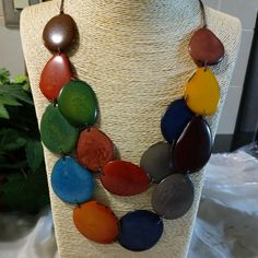 Multi Color Set Of An Organic Vegan Tagua Nut Necklace Handcrafted In Ecuador By A Master Artisan. Heart Pendant Necklace Silver, Purple Pendant Necklace, Black Pendant Necklace, Layered Beaded Necklaces, Tagua Jewelry, Cat Pendant Necklace, Tagua Nuts, Iridescent Crystal, Turquoise Bead Necklaces