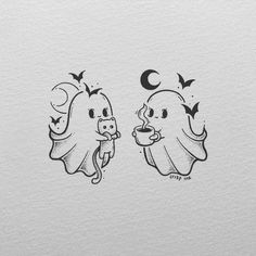 two ghost stickers on the side of a white paper with black ink, one is holding