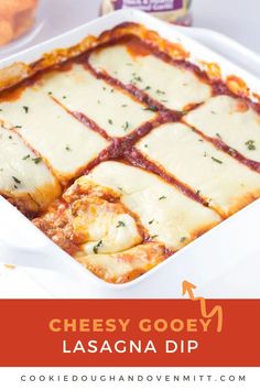 cheesey lasagna dip in a white casserole dish with text overlay