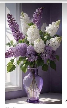 a purple vase filled with white and purple flowers