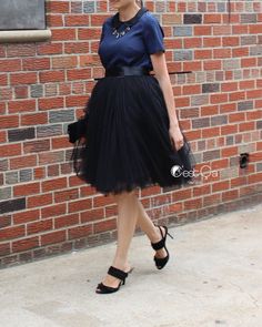 Classy and elegant midi length full volume puffy black tulle skirt for women. Pick one of the most versatile colors: dove gray, rich gray or black. This multi-layered design is perfect for those looking for puffy princess style high quality tulle skirt. – 6 layers of fine semi-hard tulle – Regular midi length 23.5″ – Stretchy waistband – Non-sheer lining – Handmade Add matching satin ribbon sash HERE FULLNESS: PUFFY | SEMI-PUFFY | NON-PUFFY HOW IT FITS:* Small (appx. US sizes 0-6): Waist 24-32″ Plus Size Tutu, Tulle Skirt Bridesmaid, Puffy Tulle Skirt, Tulle Outfit, Black Tulle Skirt, Tulle Skirts Outfit, Bridesmaid Skirts, Tulle Skirt Black, Full Volume