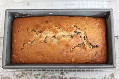 a loaf of banana bread on a cooling rack